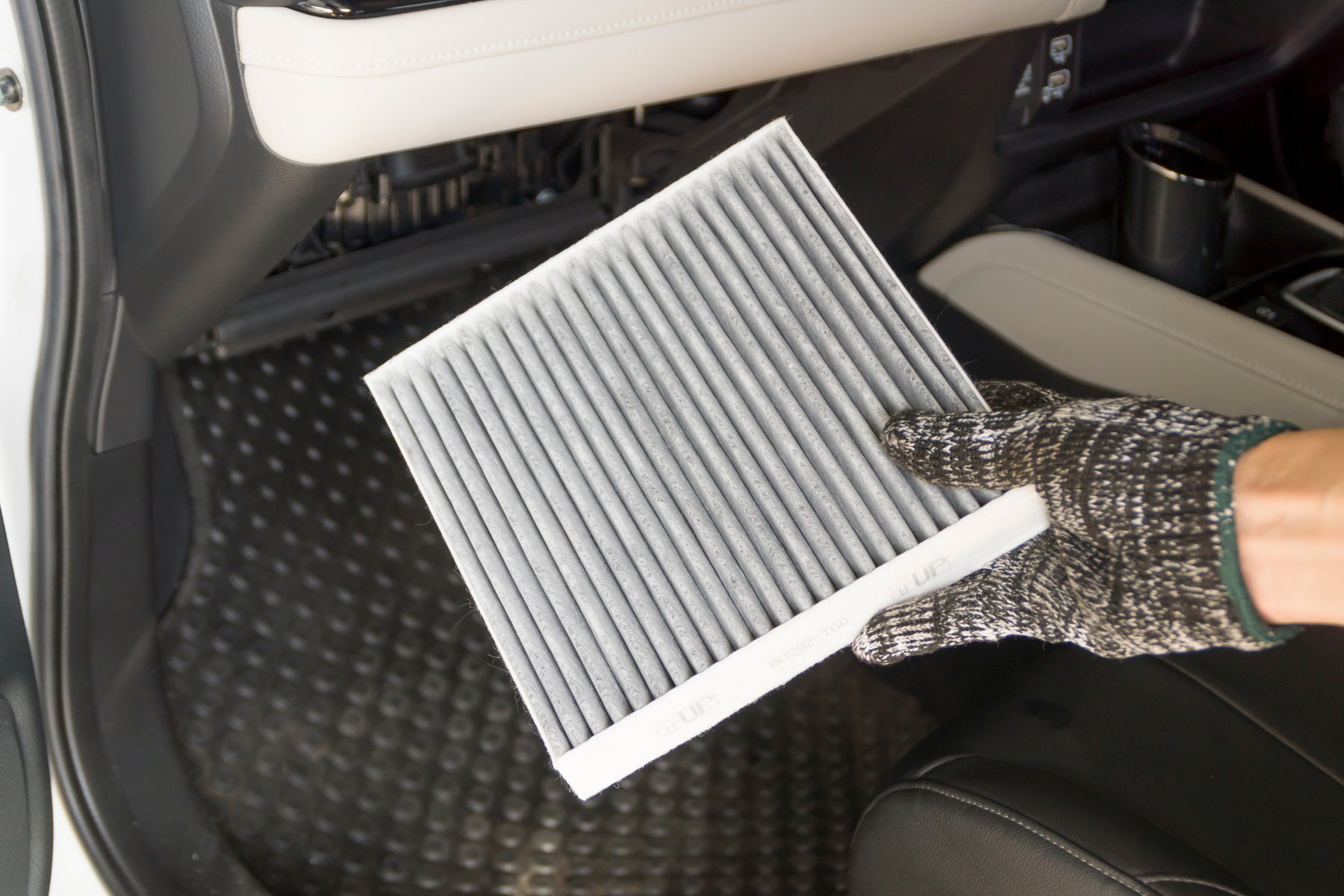 Auto mechanic replace car cabin air filter, Car maintenance service.